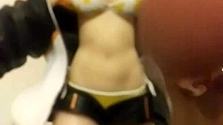 Cumshot on the bikini babe in the middle of the anime figures